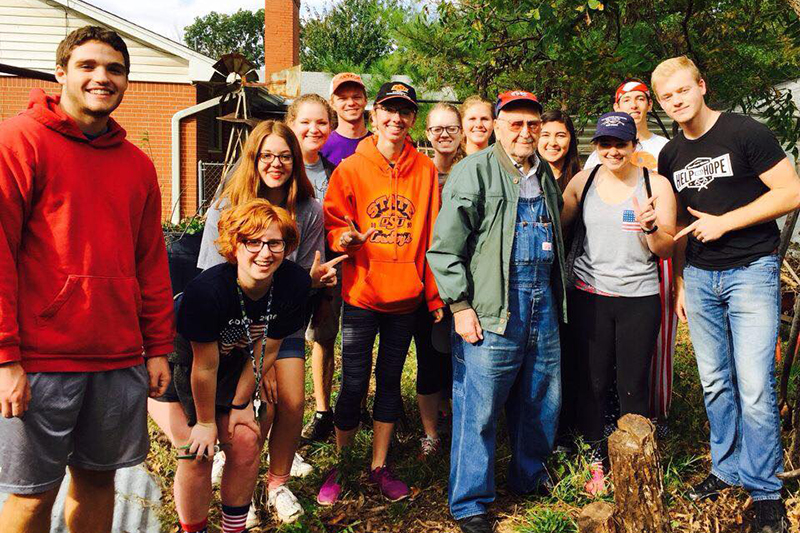 The Honors College gives back to the Stillwater community. These students volunteered at Into the Streets.